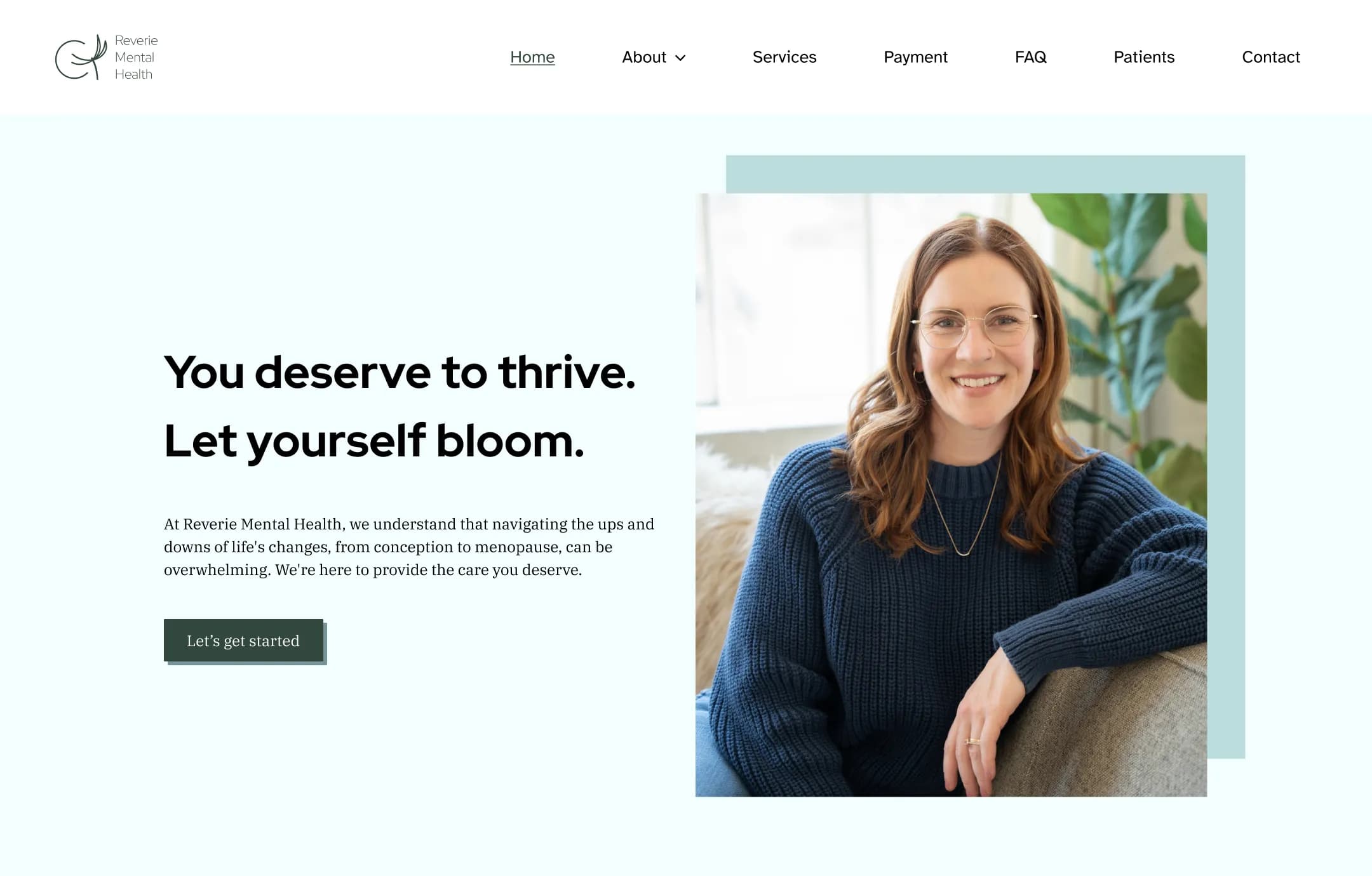 Hero section of a website with text next to a woman&#x27;s portrait.